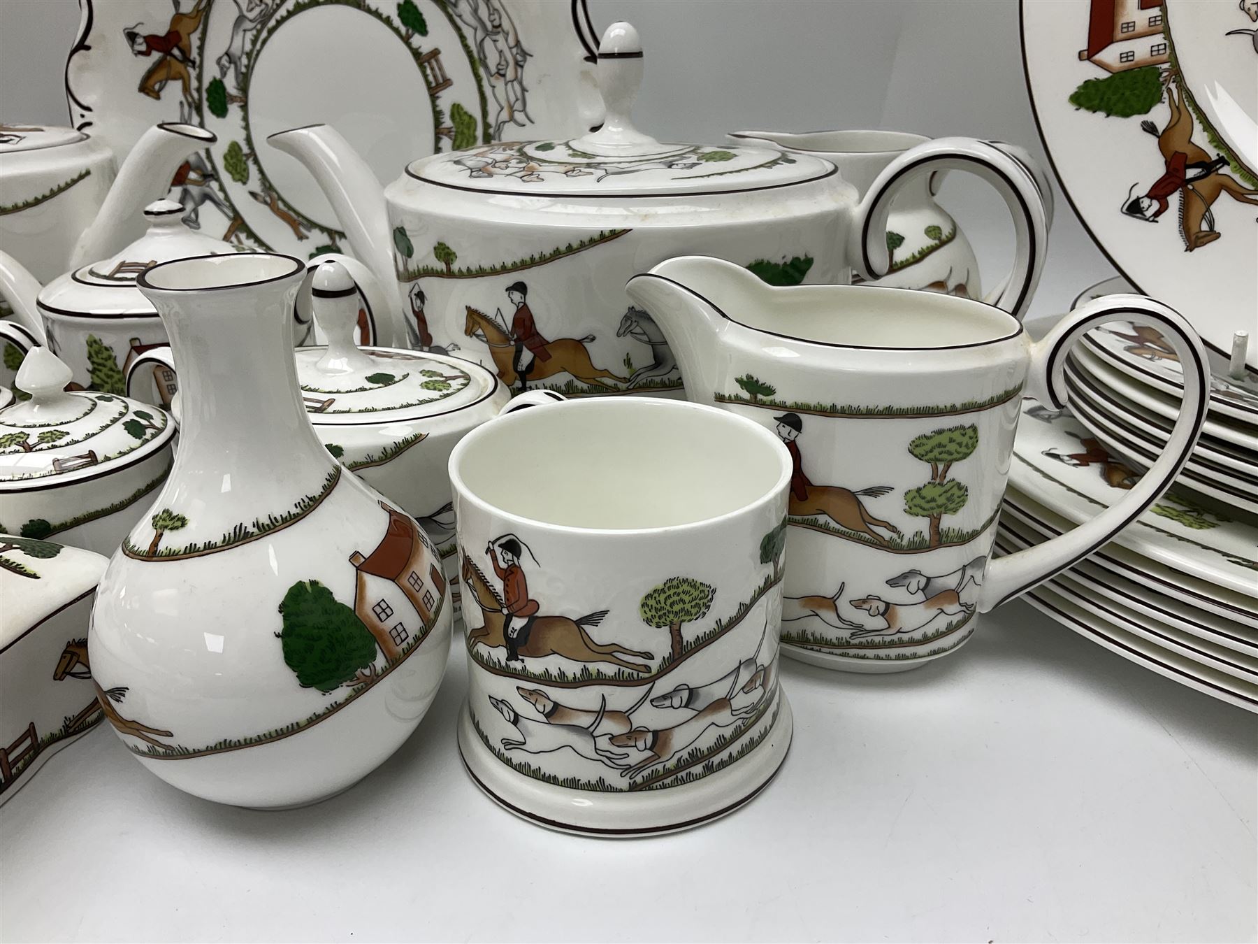 Wedgwood Hunting Scenes dinner and tea service for ten, to include dinner plates, side plates, dessert plates, cups and saucers, mugs, two large teapots, two milk jugs, etc, together with matching items by coalport and Staffordshire (94)