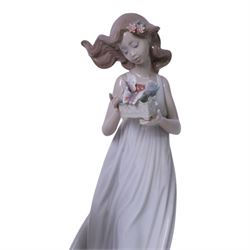 Four Lladro figures, comprising Summer Infatuation 6366, Butterfly Treasures 6777, Girl with Calla Lilies 4650 and Shepherdess with Dog 1034