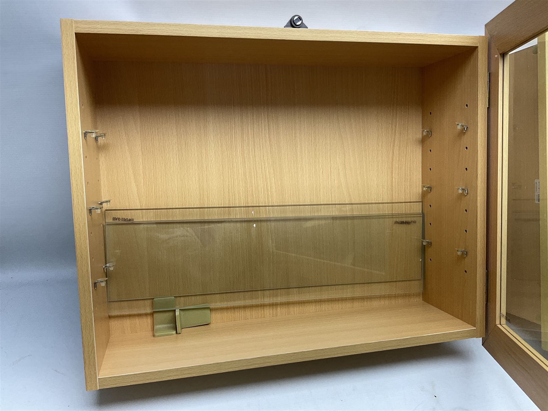 Set of four Livarno wall mounting model display cabinets, each with simulated beech finish and side hinged glazed door enclosing adjustable plate glass shelves W62.5cm H50cm D17cm (4)