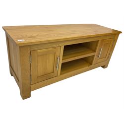 Light oak television stand, fitted with open shelves and two cupboards