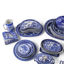 Collection of blue and white dinner wares, mainly Wedgwood Willow pattern, including serving platter, dinner plates etc   