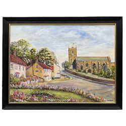 J Courtland (British 20th century): 'Hunmanby Village' near Filey, oil on canvas board signed, titled verso 30cm x 40cm