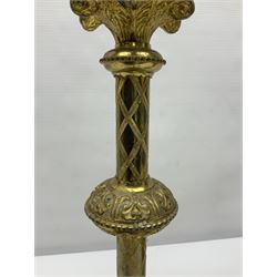 Pair of gilt metal pricket candlesticks, with applied decoration on knopt stems and triform bases, H47cm