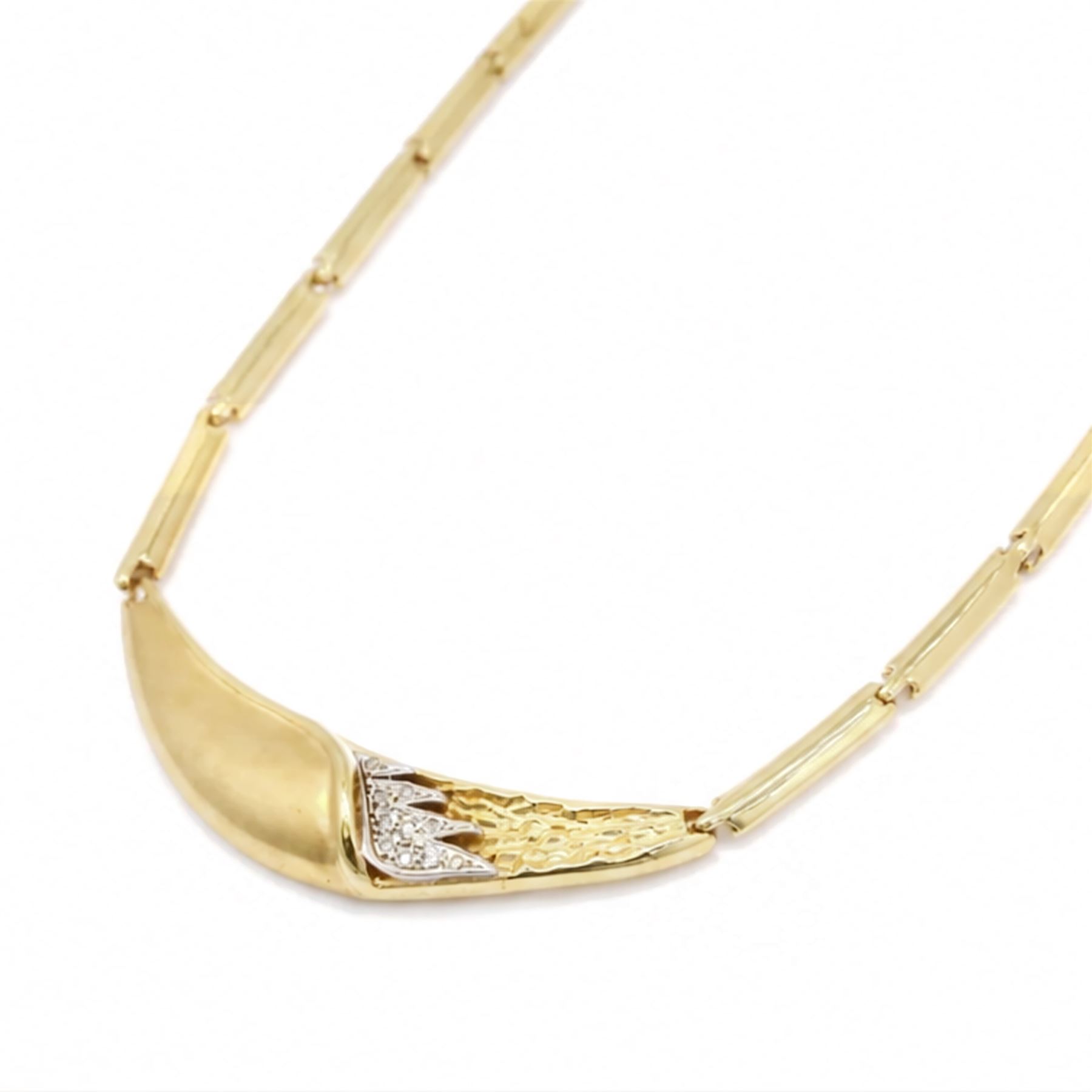 14ct yellow and white gold cubic zirconia abstract design necklace, stamped 585