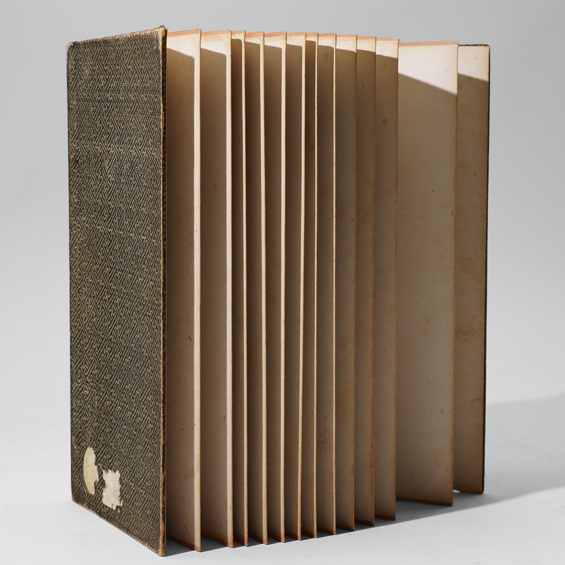 Chinese fold out book, comprising 12 hand-coloured woodblock landscapes each bearing inscription and artists seal  