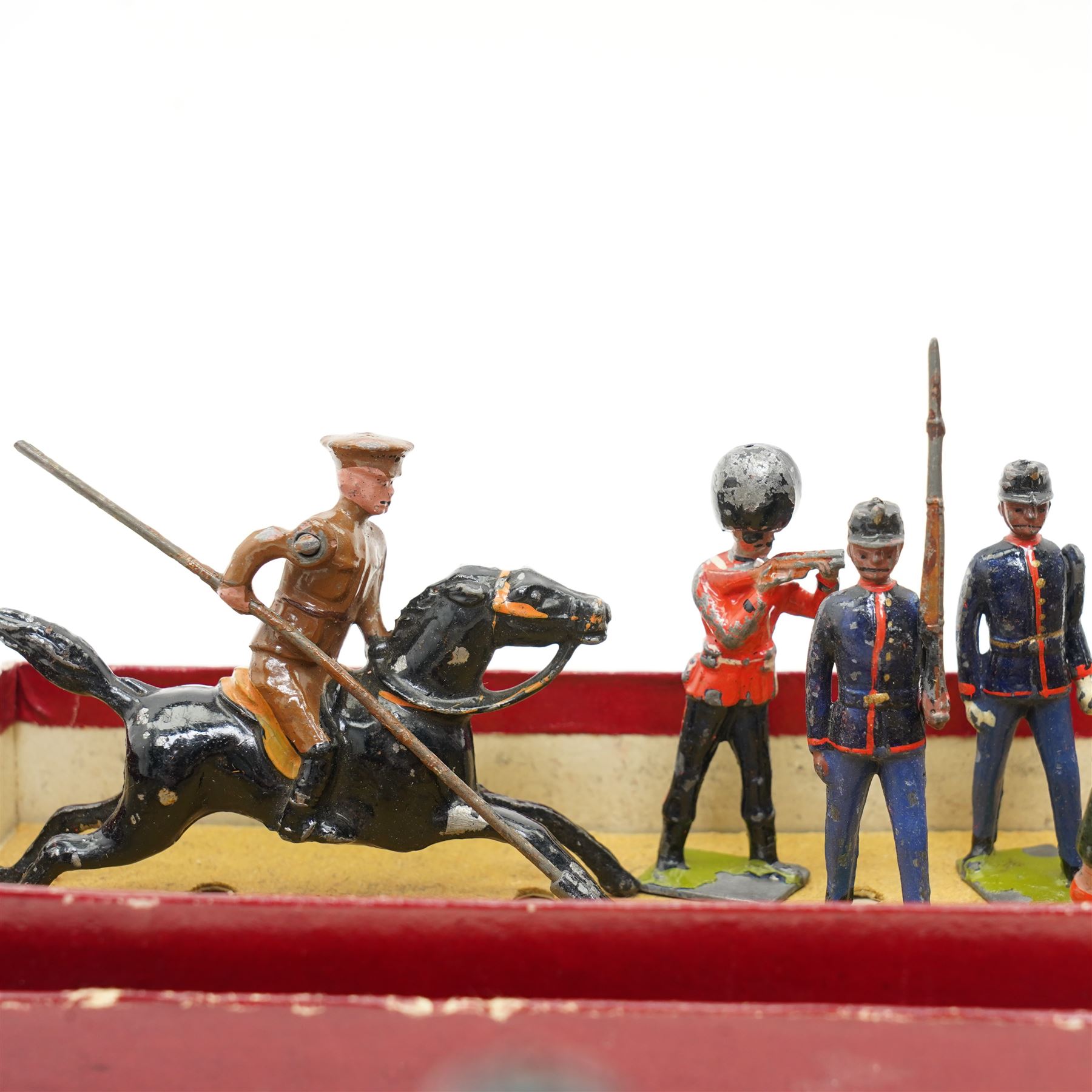 Set of fourteen Johillco lead cavalry on white horses, some with pennants, Britains overseas and colonial foot soldiers and cavalry and a Britains Zouaves box