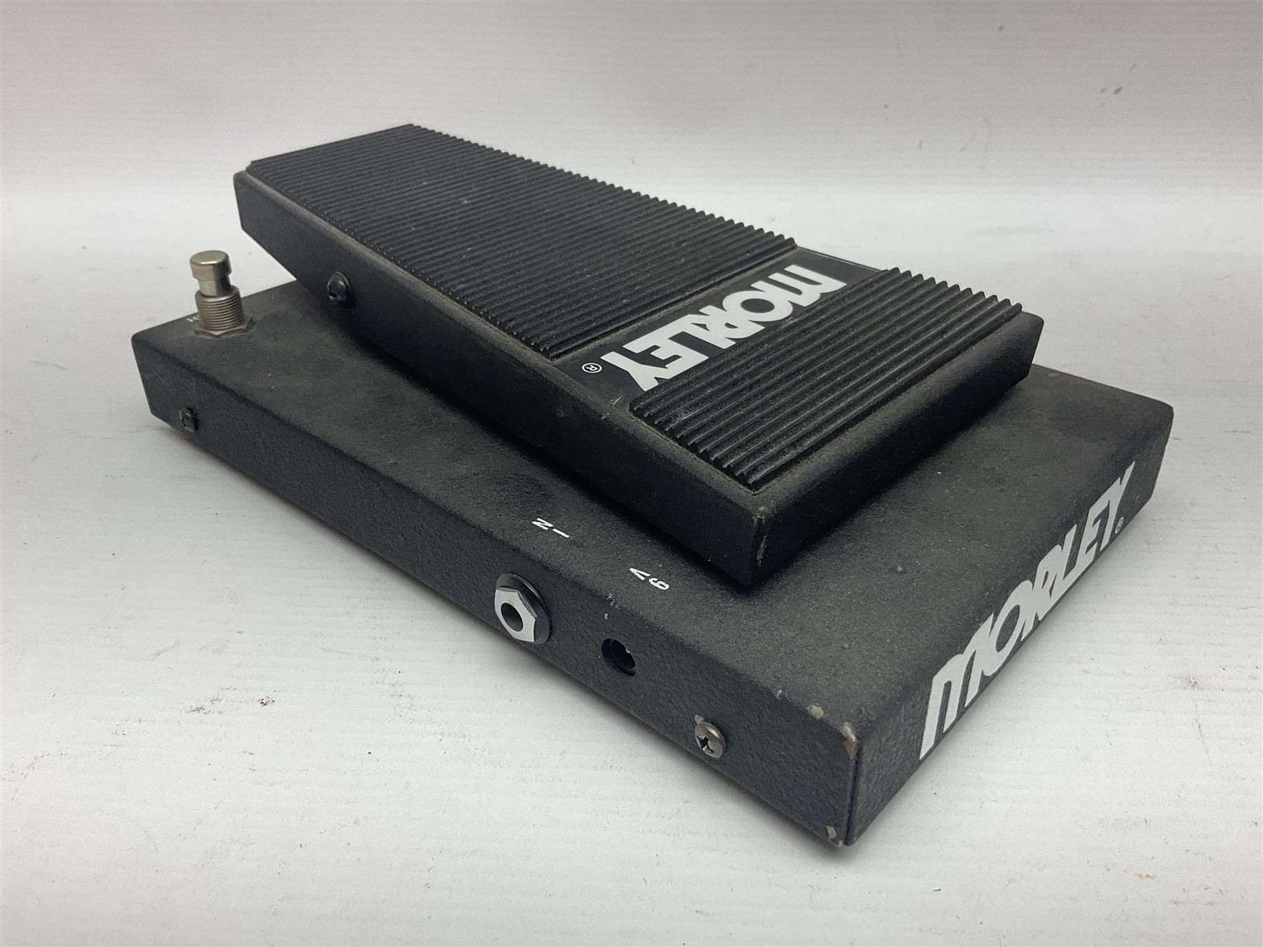 Three Morley guitar effects pedals, including The Little Alligator Volume serial no 195408 and Dual Bass Wah model PBA-2