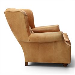TETRAD for John Lewis - brown leather upholstered wingback armchair, button back with diamond tufted detail, loose seat cushion with piped edge, scroll arms and padded side wings, on short supports