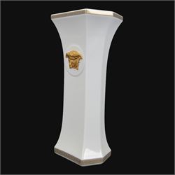 Rosenthal Versace Gorgona vase, of rectagular form with fluted base and rim, decorated in relief with medusa masks and gilt greek key borders upon a white ground, boxed, H25cm