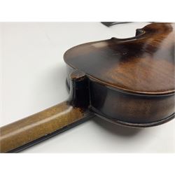 German violin c1890 with 36cm two-piece maple back and ribs and spruce top; bears label 'Antonius Stradivarius Cremona Faciebat Anno 1729' L59.5cm overall; in ebonised wooden 'coffin' case; and two German violins c1890 for completion - one bearing a Stradivarius label, the other a Ruggeri label; both in carrying cases (3)