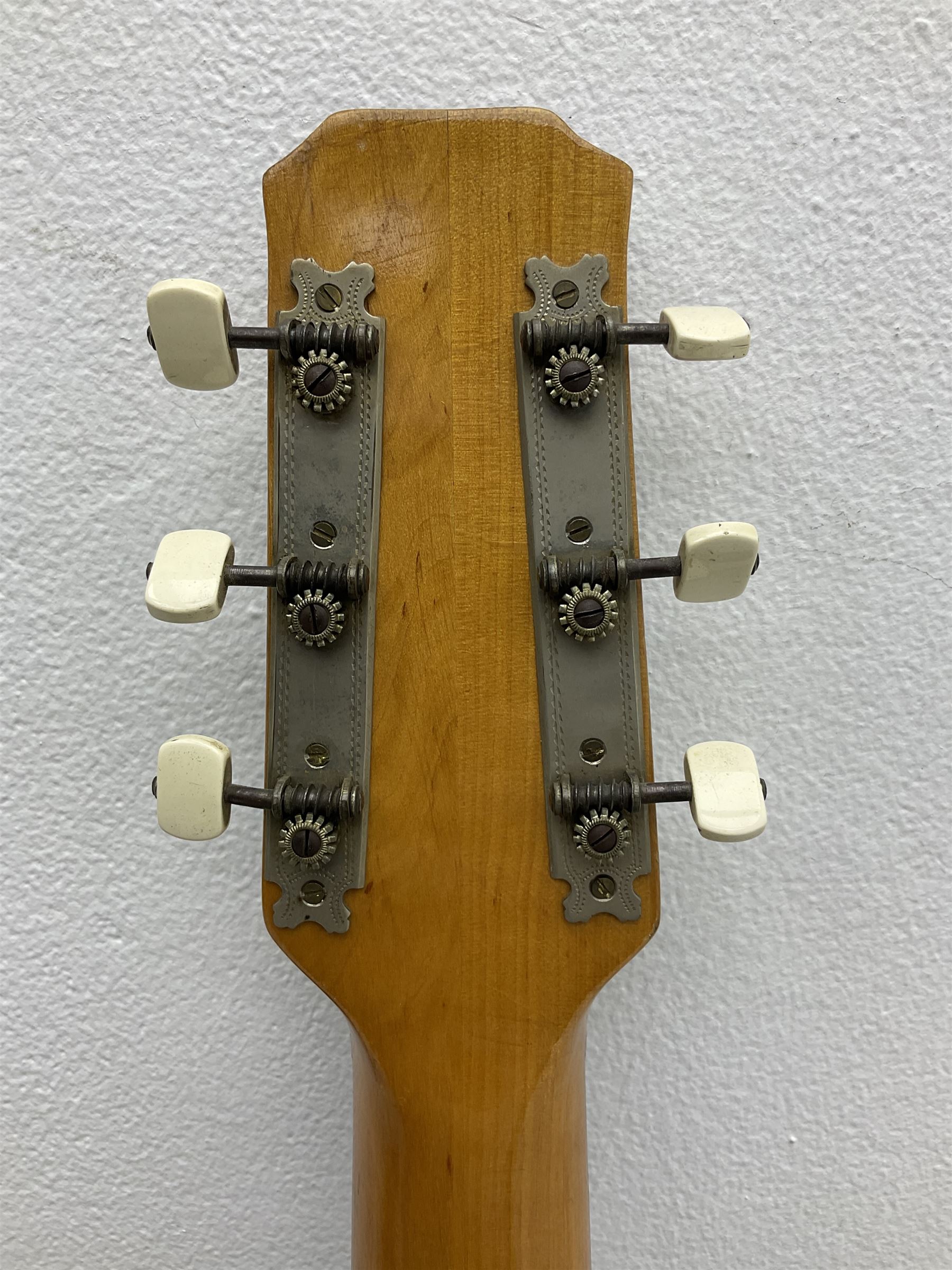 1950s acoustic guitar with f-holes and pickguard L105cm; black fur lined hard carrying case