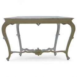 Early 20th-century Rococo revival-style console table, white serpentine-shaped marble top with moulded edge, frieze with openwork scrolling foliage, rocaille shells and deep apron, stretcher with central carved cartouche with shell and foliate motifs, supported on four cabriole legs, knees carved with acanthus leaf and terminating in scroll feet 