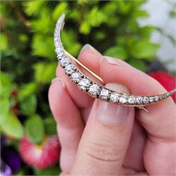 19th century silver and gold diamond crescent moon brooch, set with twenty-one graduating old cut diamonds and six rose cut diamonds, total diamond weight approx 2.00 carat