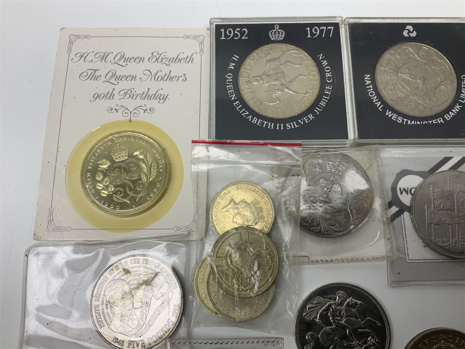King George VI 1937 crown coin, various commemorative crowns, Queen Elizabeth II Canada 1957 and 1959 fifty cent coins, four Great British five pound coins, United States of America 1964 half dollar etc