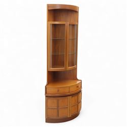 Nathan for Parker Knoll - corner cabinet, the upper section enclosed by two curved glazed ...