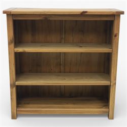 Contemporary pine open bookcase, fitted with two shelves