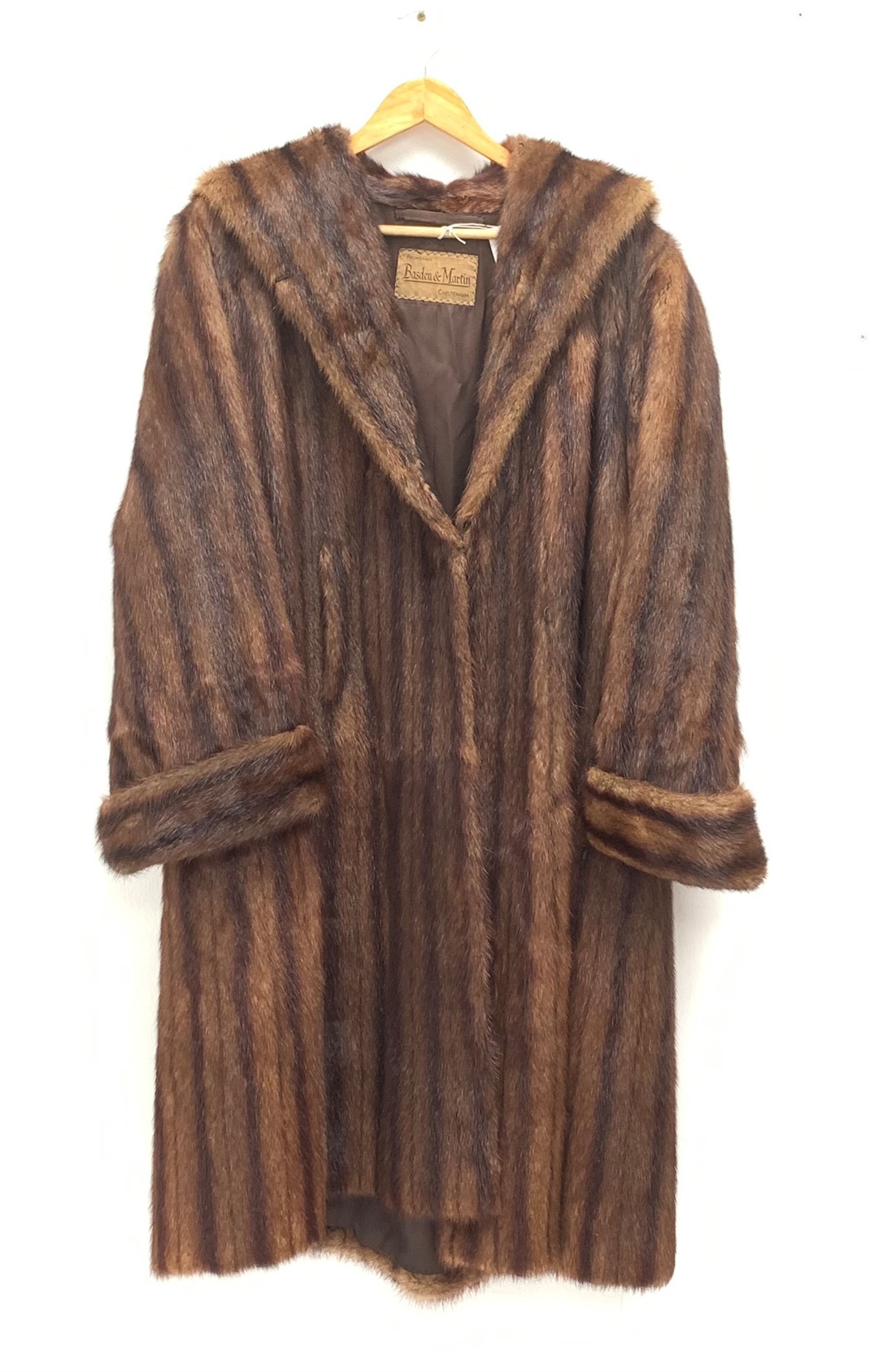 A lined Musquash fur coat - Decorative Antiques & Collectors Sale