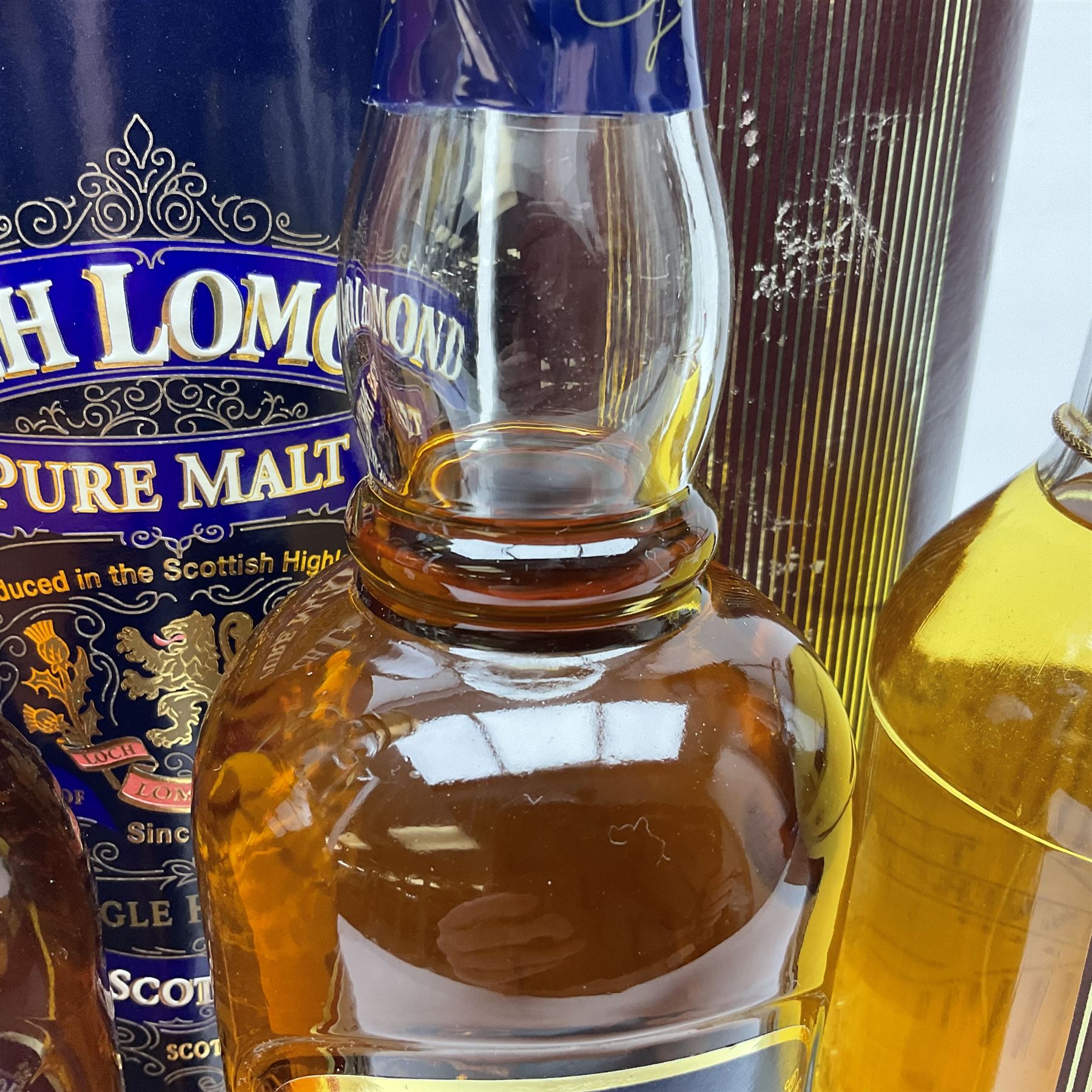 The Invergordon, 10 year old, single malt Scotch whisky, 70cl, 43% vol, Glenfarclas, 10 year old, single malt Scotch whisky 700ml 40% vol and Loch Lomond, single malt Scotch whisky 0.7l 40% vol, all boxed   