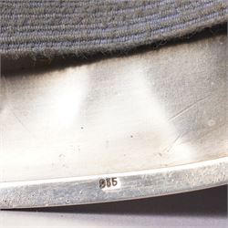 Early 20th century Continental silver and enamel cigarette case of rectangular cushion form, the front enamelled with a capercaillie in a Scottish woodland scene, marked 935, 9cm in length