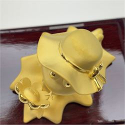 24ct gold model of a snake wearing a hat on a leaf with a sunflower, within a display case, with original box, retailed by Chow Tai Fook Jewellery, Hong Kong