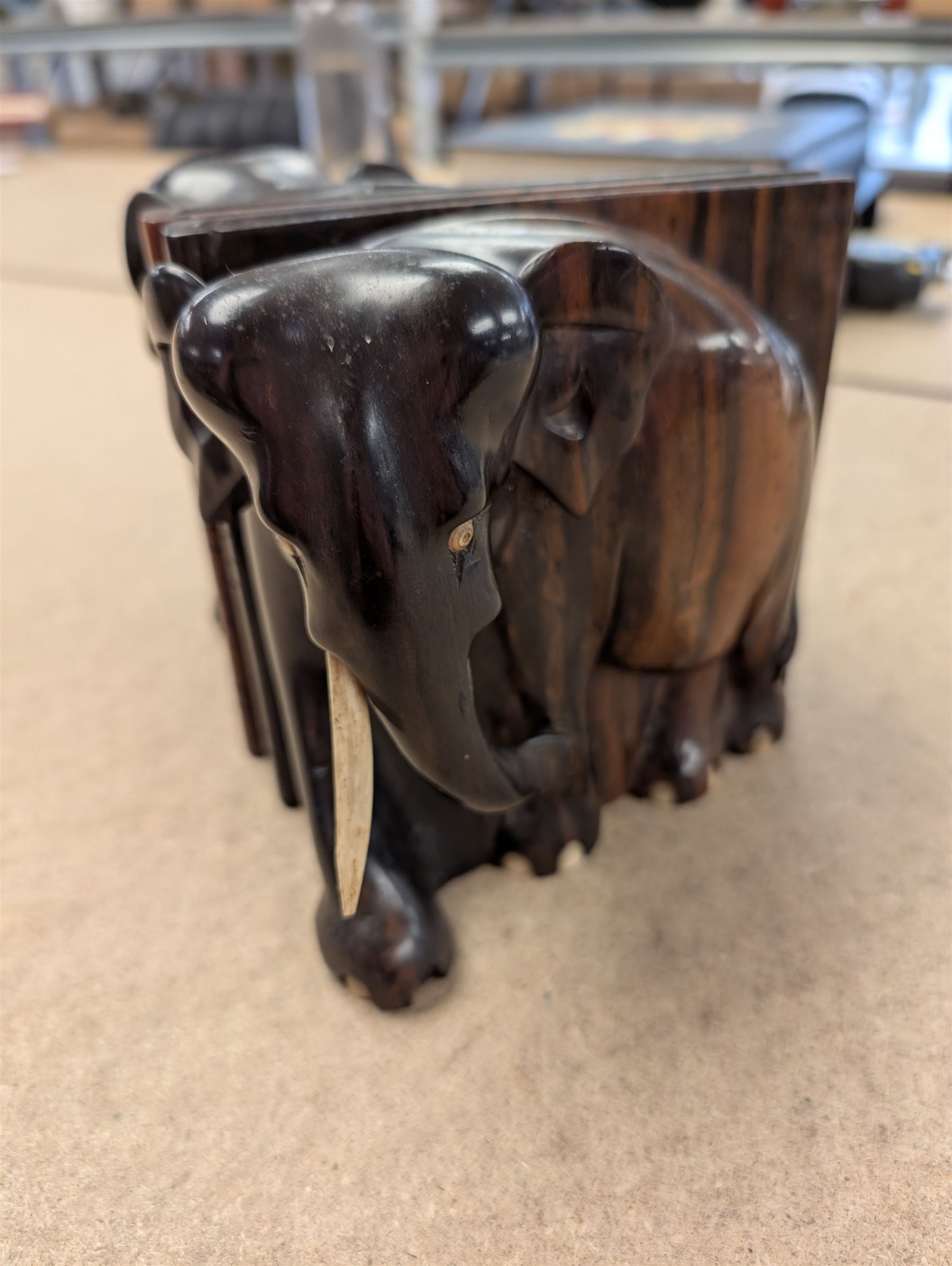 Pair of carved elephant bookends with bone tusks, H14.5cm