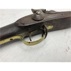 20th century Indian percussion musket, the 76cm barrel with two bands, indistinctly inscribed lock-plate, walnut full stock stamped 642 with brass butt and trigger guard and under barrel ramrod channel L121cm overall