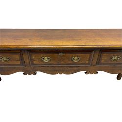 Georgian design oak dresser base, moulded rectangular top over three drawers with moulded fronts and mahogany bandings, shaped apron on cabriole front supports