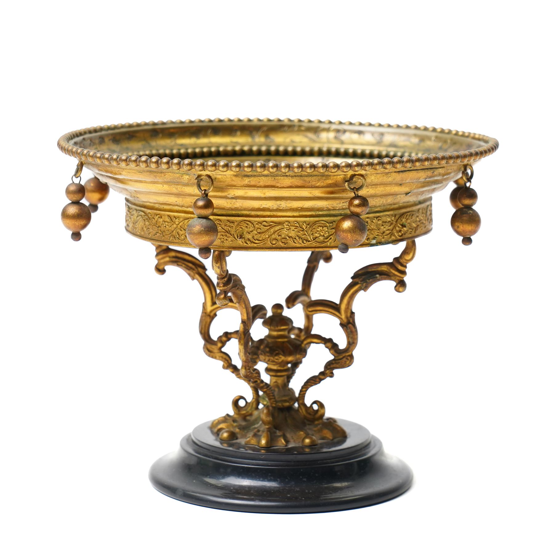 Italian Grand Tour pietra dura and ormolu tazza, the circular black stone top inlaid with a marble floral spray, within a beaded and foliate-cast ormolu rim hung with pendant spheres, on a scroll and acanthus-cast support and turned base, Florence, late 19th century, W15.5cm H12cm