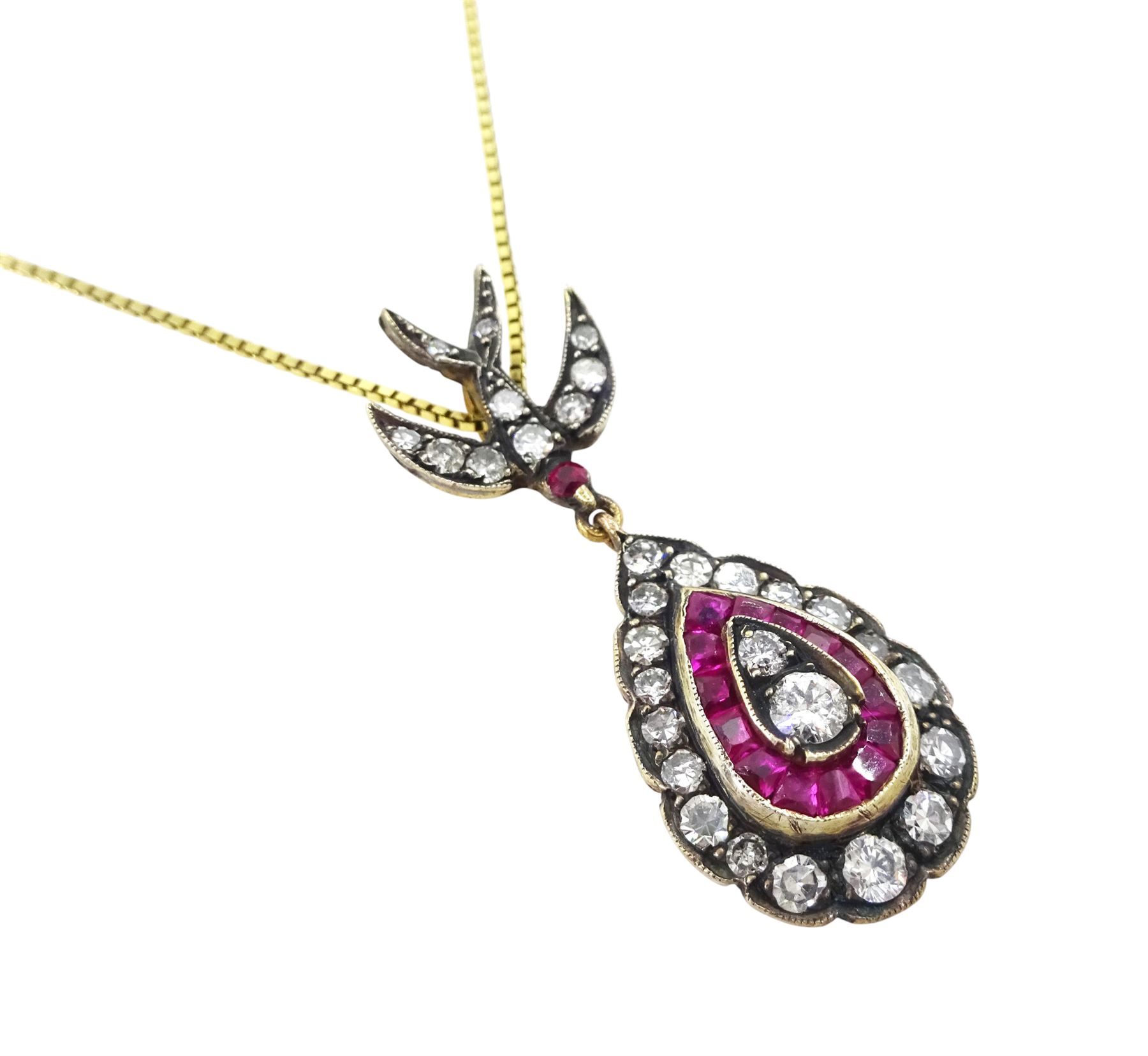 Gold and gold-plated diamond and ruby pendant necklace, the pear shaped pendant, milgrain set with round brilliant cut and single cut diamonds and calibre cut rubies, suspending from a ruby and diamond swallow bail, on a silver-gilt chain, total ruby weight 0.35 carat, total diamond weight 0.60 carat, with World Gemological Institute Report 