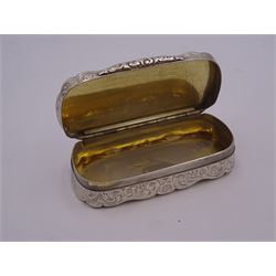 Victoria silver snuff box, of oblong form with shaped edges, engraved with personal inscription to the hinged cover, and foliate decoration to cover, sides and base, opening to reveal a gilt interior, hallmarked Alfred Taylor, Birmingham 1855, L8.5cm, approximate weight 2.66 ozt (82.7 grams)