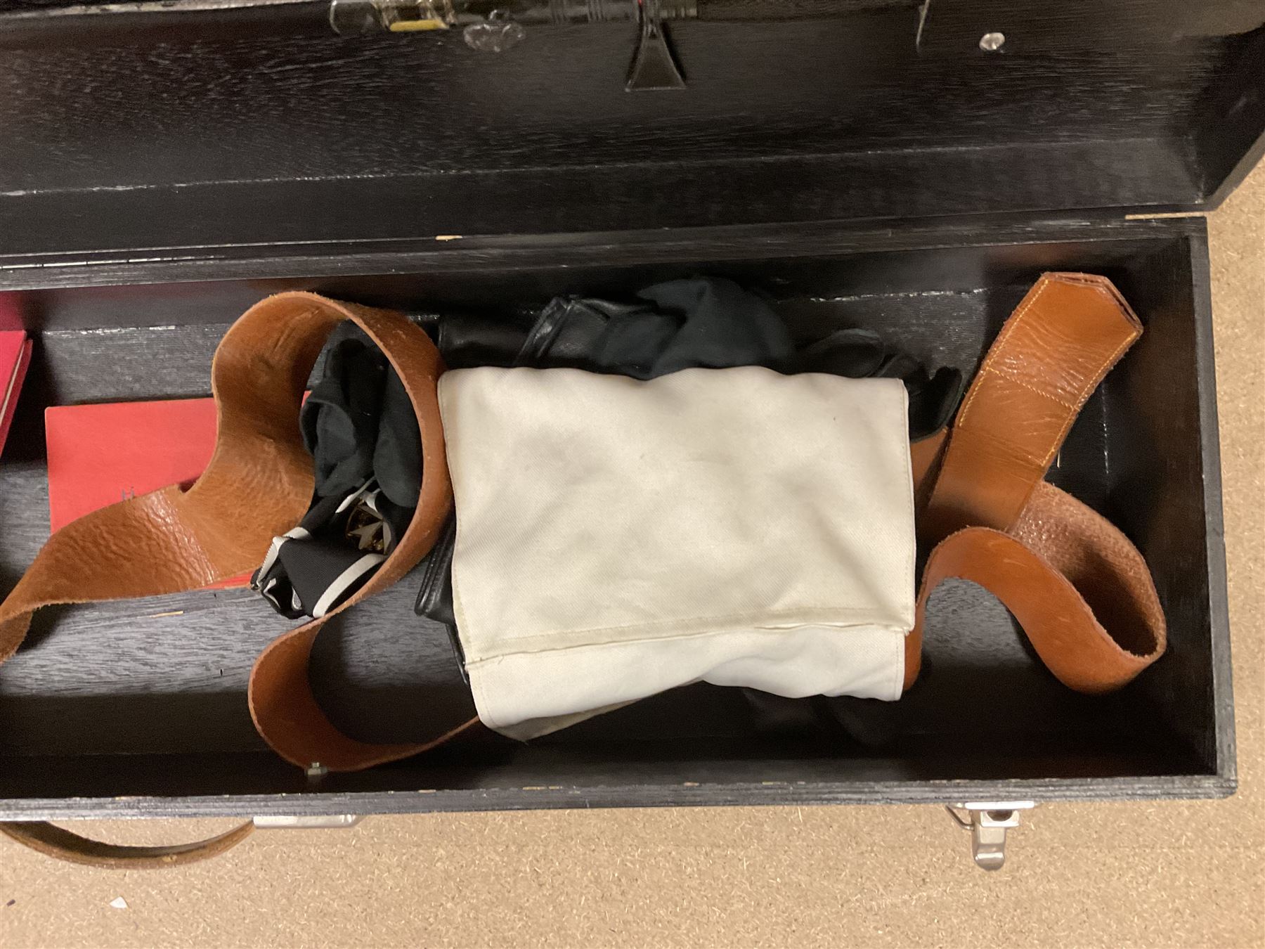 Masonic regalia, including sword, kid leather gloves and apron, Order of Holy Wisdom high priest mitre, etc, contained within briefcases and boxes 
