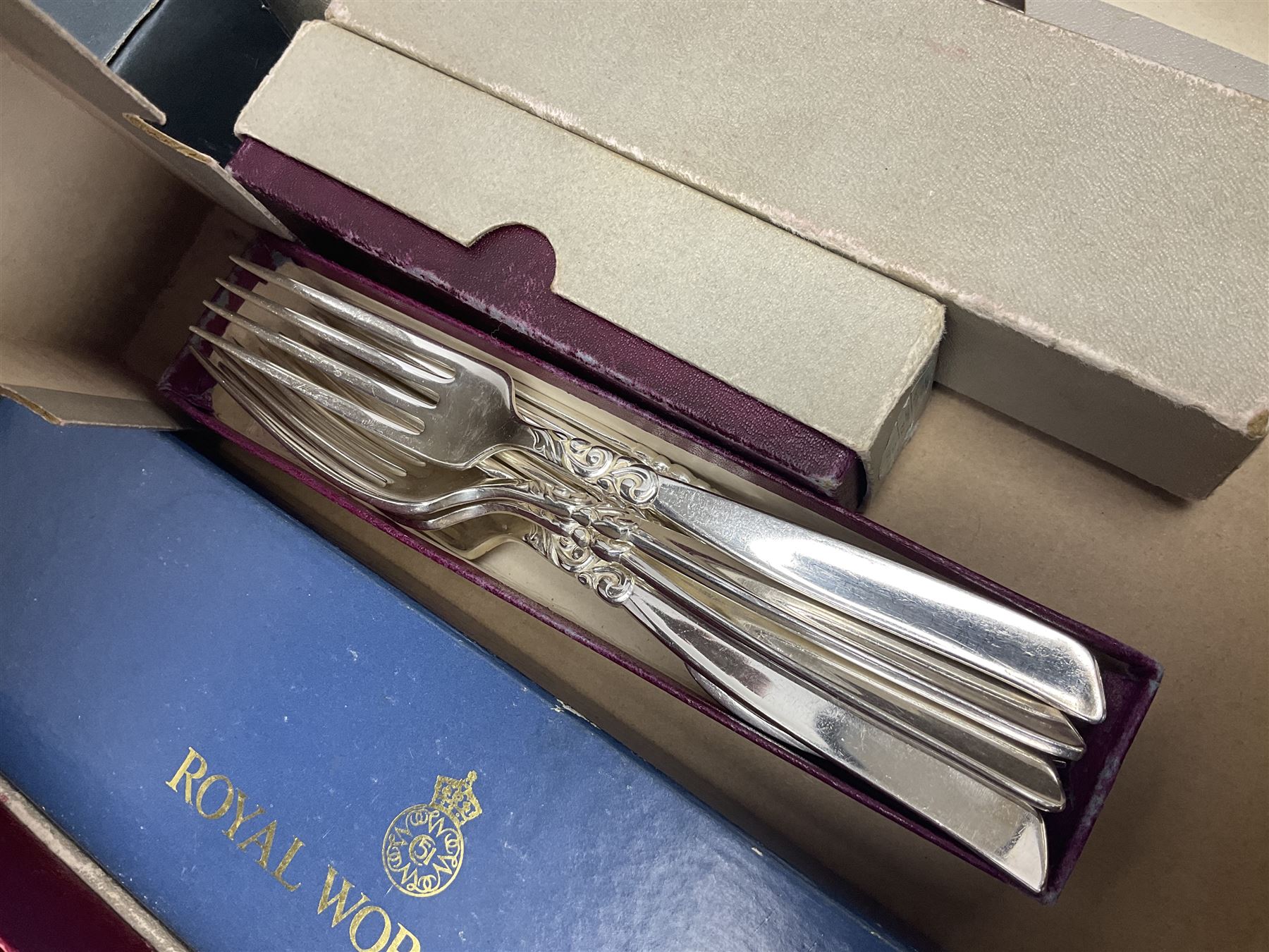 Quantity of silver plated and other metal ware to include Community cutlery and brass, together with Polaroid tv etc in three boxes