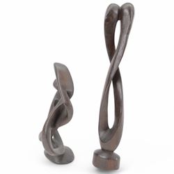 Two African carved abstract wooden sculptures, tallest H54cm