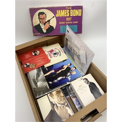 Eight James Bond calendars 2003-10 (two 2004 but lacking 2005), four LP records for Goldfinger and Greatest Hits x3, four 45rpm records of theme tunes, two boxed sets of DVDs and another of 007 The Car Chases