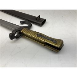 French model 1866 sabre bayonet, the 57.5cm curving blade marked St. Etienne 1868; in associated steel scabbard L71cm overall