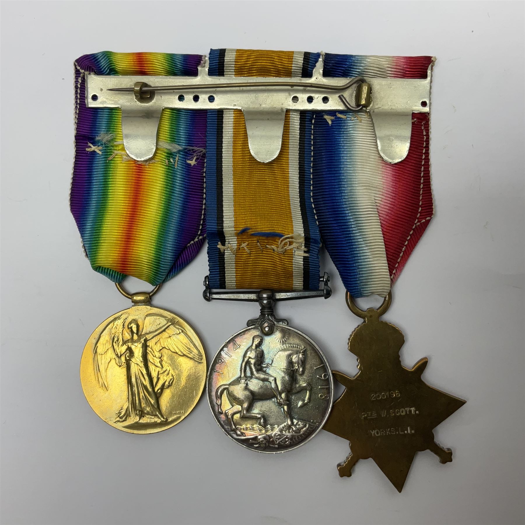 WWI trio of medals comprising British War Medal and Victory Medal awarded to 1815 Pte. W. Scott K.O.Y.L.I. and 1914-15 Star awarded to 200196 Pte. W. Scott Yorks. L.I.; with ribbons on wearing bar
