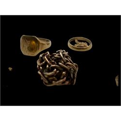 9ct gold charms, including crossed swords, signet ring, horseshoe and leaf, and a 14ct gold fireplace charm