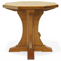 Mouseman - 1950s oak coffee table, octagonal adzed top on cruciform base and sledge feet, carved with mouse signature, dated 1956 and engraved 'Sylvia' to the top edge, by Ken Almack of the workshop of Robert Thompson, Kilburn

Notes:
Made by Ken Almack at the Robert Thompson workshop, Kilburn, where he trained and worked as a Mouseman craftsman; brother of Colin ‘Beaverman’ Almack, who later established his own workshop. The table was made for Sylvia to mark their engagement in 1956, prior to their marriage in 1957.

Provenance: The estate of Ken Almack; Tennants Auctioneers, 20th Century Design, 5 October 2024.