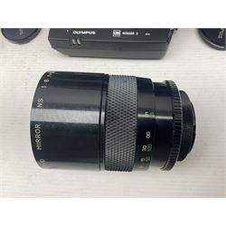 Olympus OM-2 camera body, serial no 1117526, with Olympus OM-System Zuiko Auto-W 28mm 1:2.8'  lens serial no 336591, Olympus OM10 camera body serial no 2392257, with Olympus OM-System Zuiko Auto-Macro 50mm 1:3.5' lens serial no 225784, Soligor C/D mirror lens 1:8 f=500mm' serial no 784035650 together with other camera equipment 