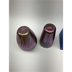 Two Art Glass Jonathan Harris vases, The first example of a baluster form, the second example of tapering cylindrical form,  each with iridescent decoration in tones of purple and blue, tallest example H18.5cm, each with makers box, together with a Isle of Wight glass paperweight. 