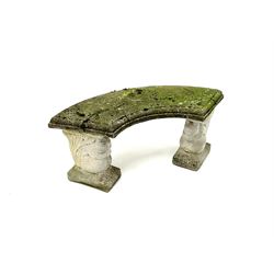 Stone garden bench, curved stone seat raised on two stone supports featuring squirrel carving