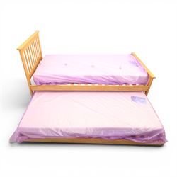 Contemporary light oak trundle bed, slatted headboard and footboard,  incorporating pull-out trundle bed on castors, complete with two memory foam mattresses