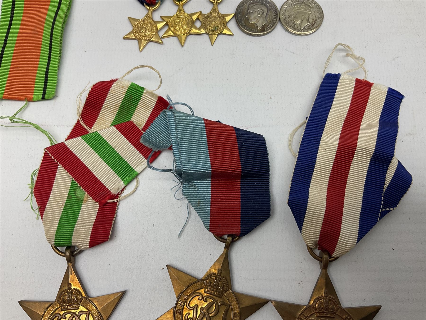 WW2 group of five medals comprising Defence Medal, 1939-1945, Italy Star, French and German Star and 1939-1945 star, with miniatures  