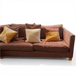 Orior - corner sofa upholstered in plum fabric, loose cushions and various scatter cushions, light wood stained feet
