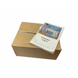 Two Singer sewing machines, model numbers 527 and 457, together with various Singer sewing machine parts, and a selection of sewing related accessories, to include threads, sewing needles, etc. 