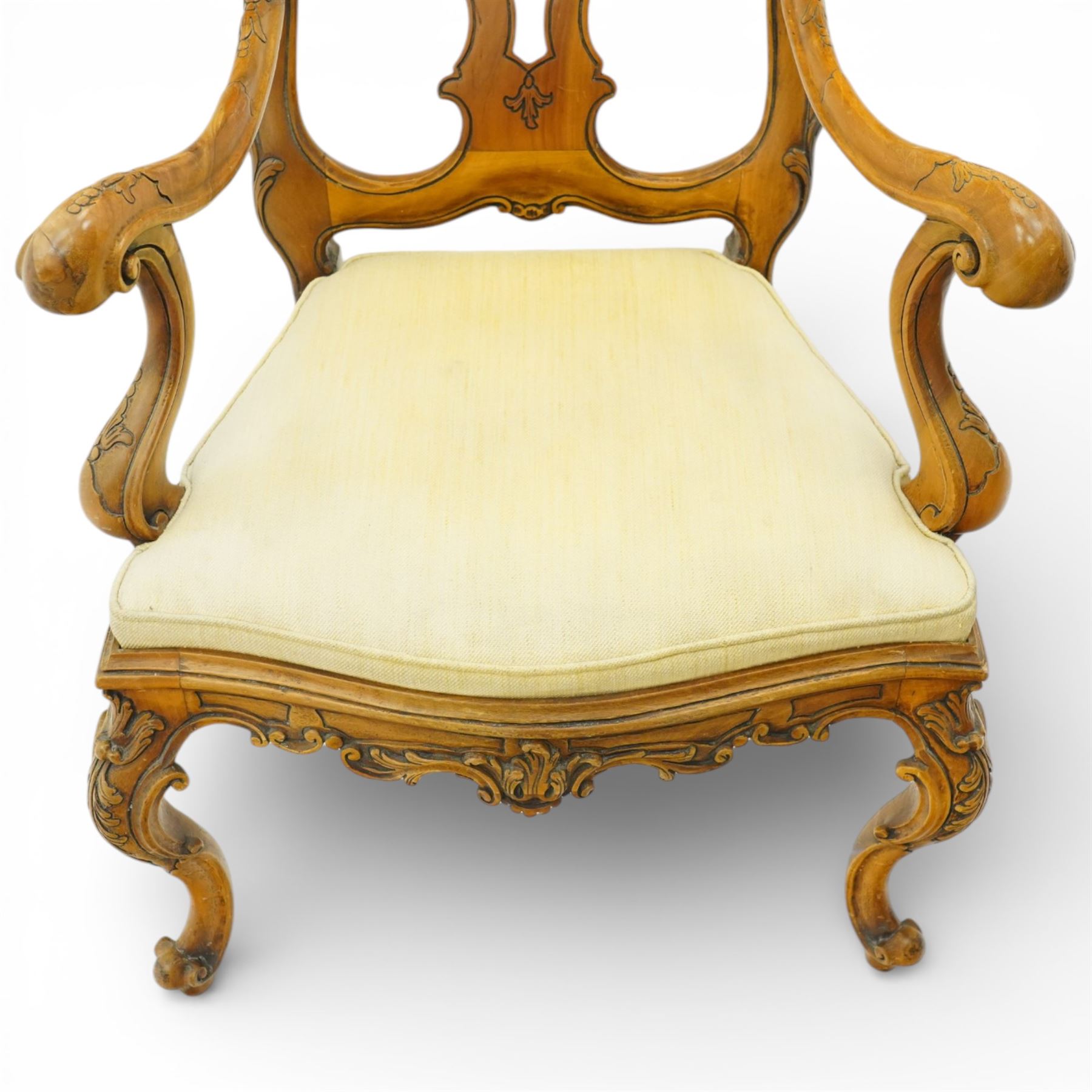 Pair of Italian carved walnut open armchairs, upholstered seats