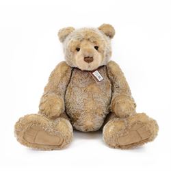 Charlie Bears large plush jointed teddy bear 'Ian', with light brown fur and brown bow, designed by Isabelle Lee, with tags, H87cm 