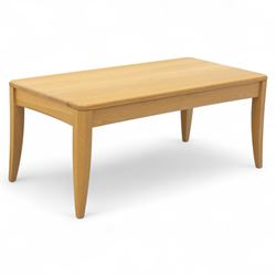 Ercol - light oak ‘Artisan’ coffee table, of rectangular form with chamfered top and gently tapered legs