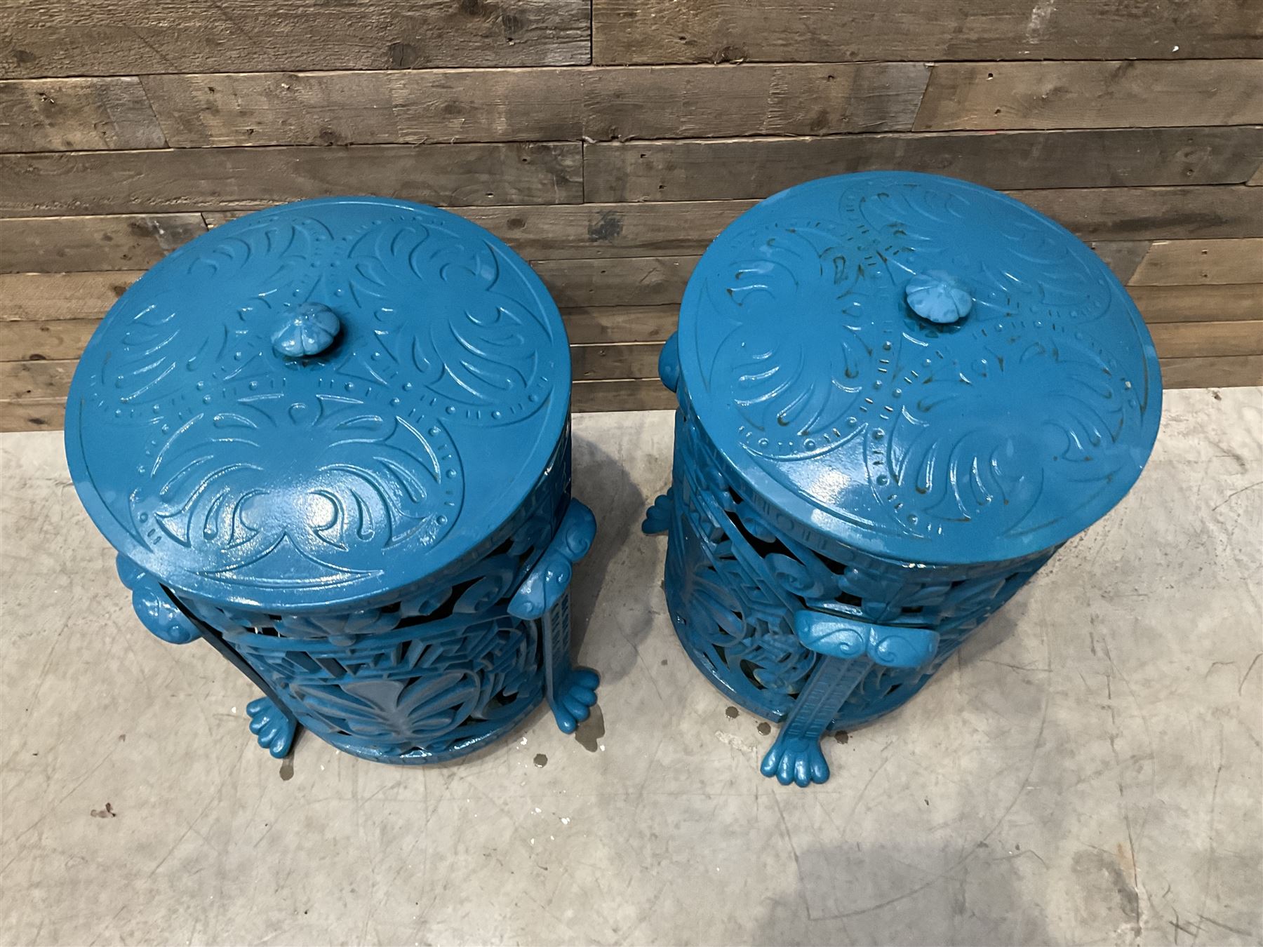 Pair of blue painted cast iron garden bins