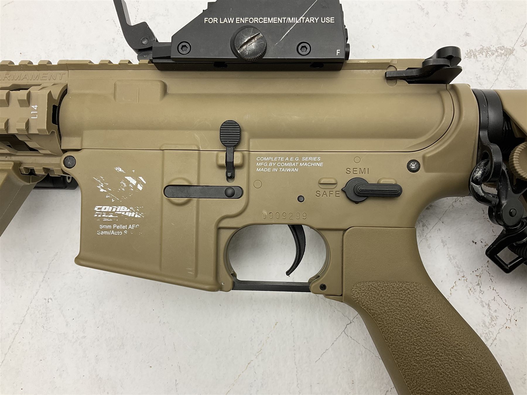 Combat Machine lithium battery powered airsoft BB rifle, 'Complete AEG Series' to fire 5mm pellets, with adjustable length stock L69cm non-extended; with six magazines, Trijicon ACOG red dot telescopic sight, battery charger etc (NO BATTERIES)